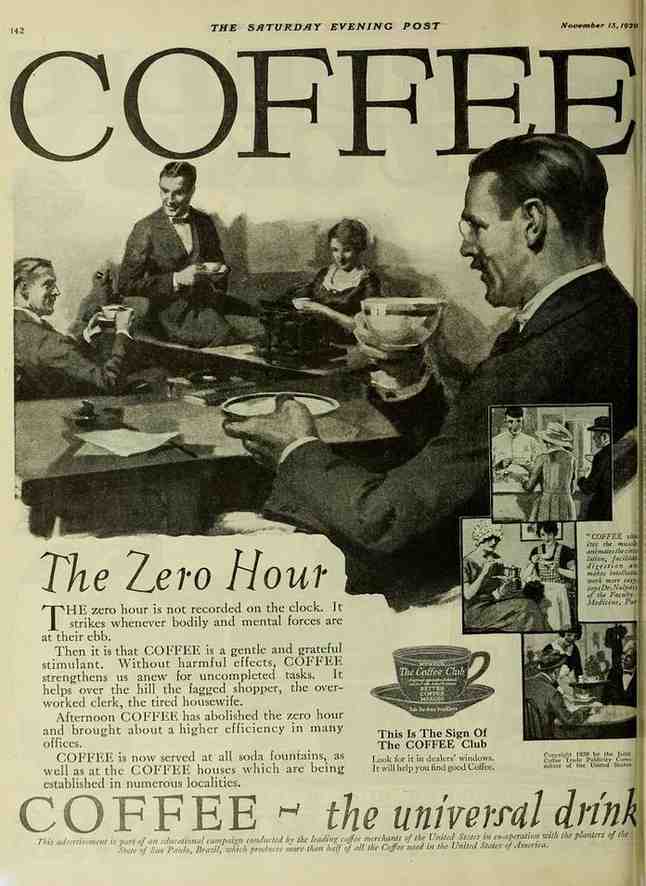 A man holding a cup of coffee