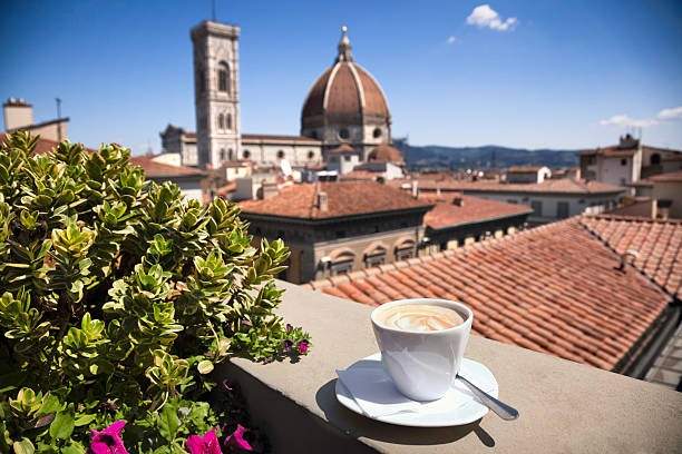 cup of coffee on window ledge