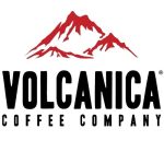 Logo of Volcanica Coffee Company featuring the company name in bold black letters below a red outline of a mountain with multiple peaks, set against a white background—perfect inspiration for easy coffee recipes at home.